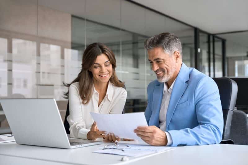 Two,Happy,Busy,Middle,Aged,Professionals,Man,And,Woman,Business SEO ROI
